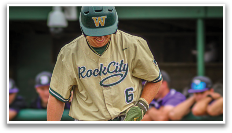 A baseball player wearing a green and gold jersey with the number 6 on it. Description generated by AI