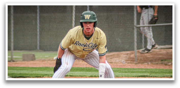 A baseball player wearing a green helmet and a yellow jersey. Description generated by AI