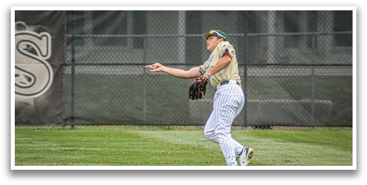 A baseball player wearing a gold and white uniform is throwing a ball. Description generated by AI