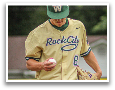 A baseball player wearing a yellow and green jersey with the number 8 on it. Description generated by AI