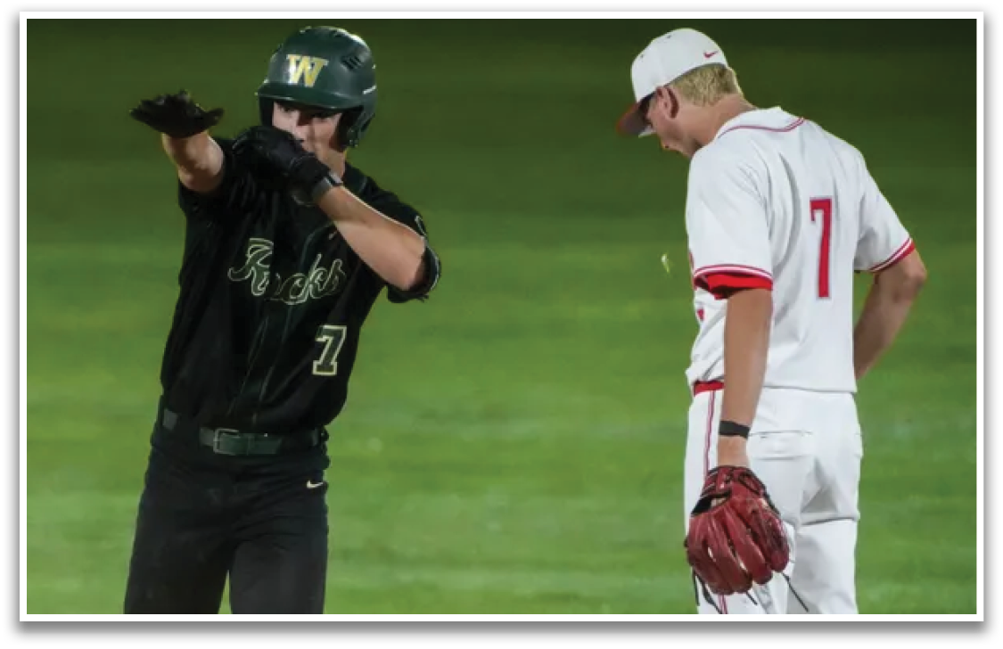 A baseball player wearing a green helmet and a gold jersey. Description generated by AI