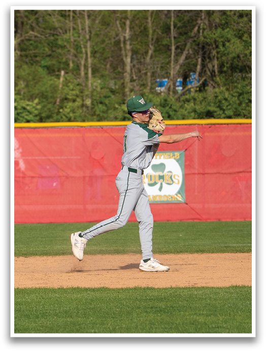 A baseball player wearing a black jersey with the number 1 on it stands on the field. AI generated content