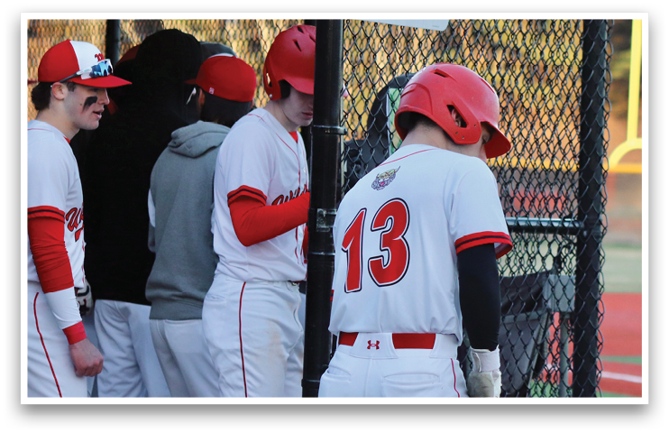 A group of baseball players wearing red and white uniforms are standing in a line. AI generated content
