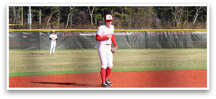 A baseball player in a red and white uniform is standing on the pitcher's mound, holding a baseball glove. AI generated content