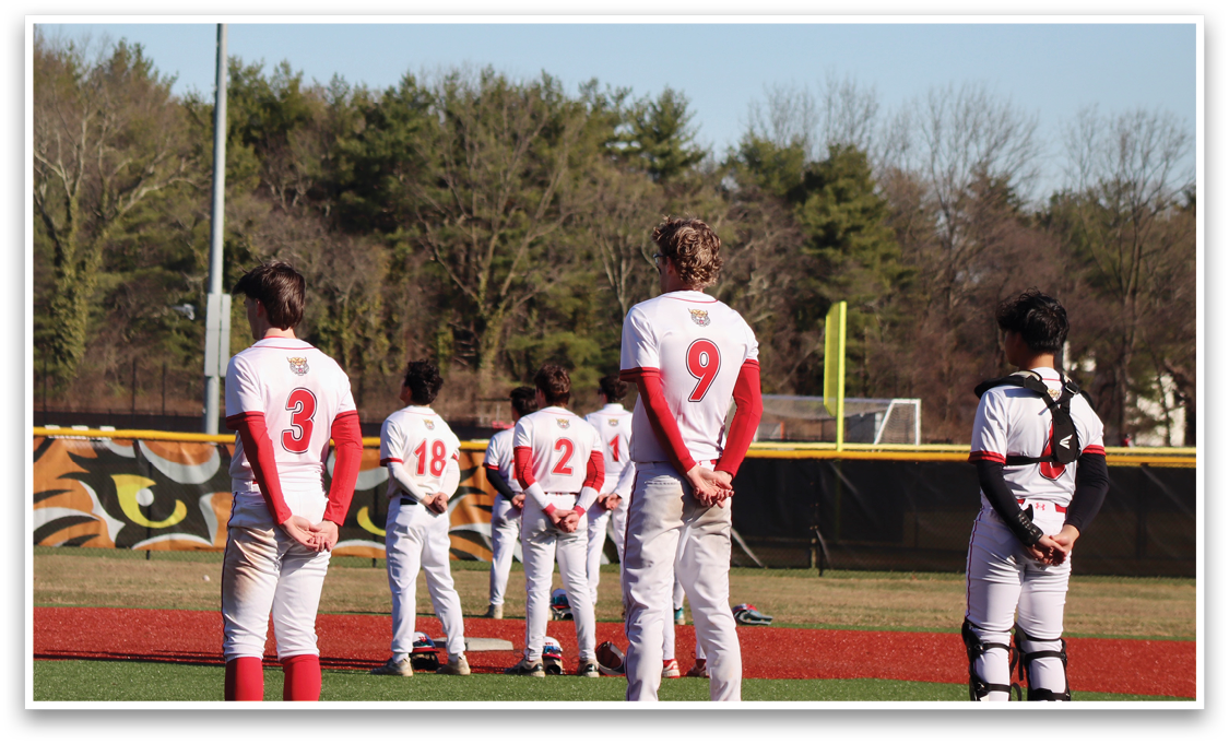 A group of baseball players are standing on a field, some of them wearing red socks. AI generated content