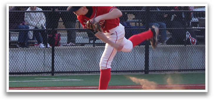 A baseball player in a red and white uniform throwing a pitch. Description generated by AI