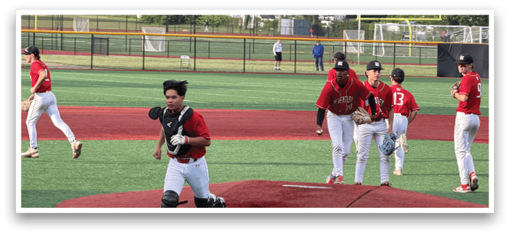 A baseball player running towards home plate. Description generated by AI