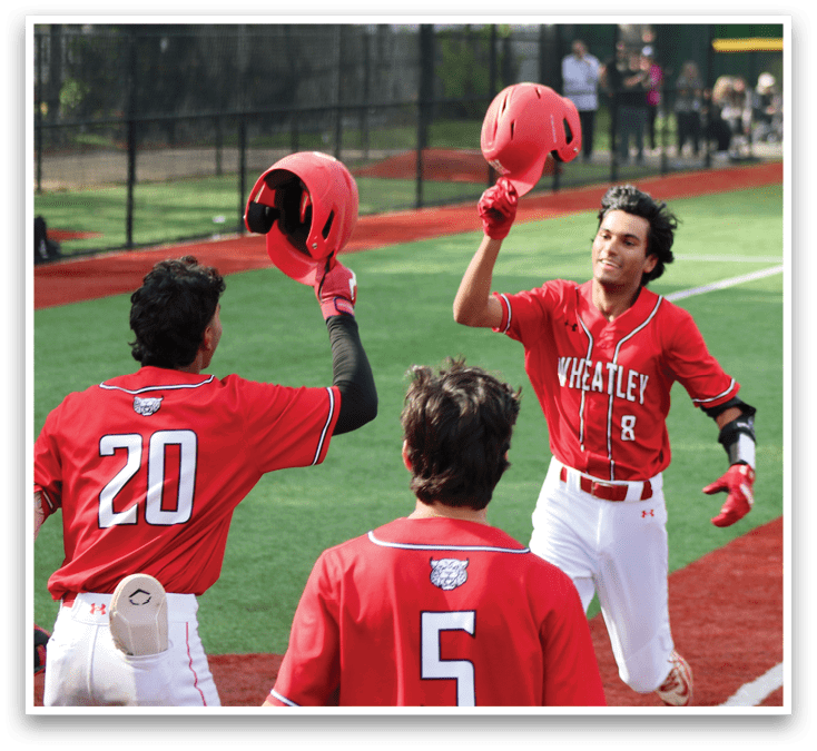 A baseball player wearing a red jersey with the number 5 on it. Description generated by AI