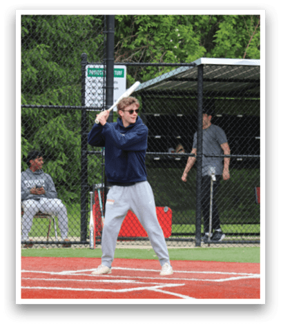 A baseball player is swinging a bat. Description generated by AI