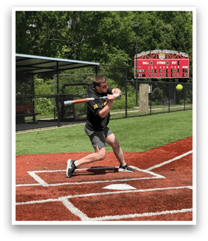 A baseball player is swinging a bat at a ball. Description generated by AI