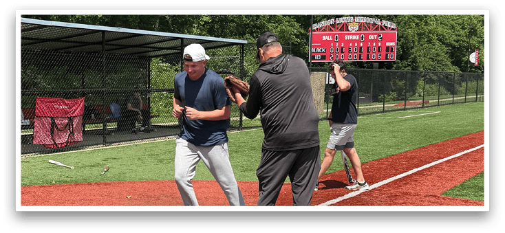 A baseball game is taking place on a field. Description generated by AI