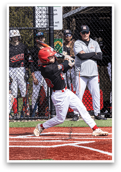 A baseball player is swinging a bat at a ball. Description generated by AI