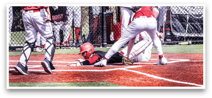 A baseball player sliding into home plate. Description generated by AI
