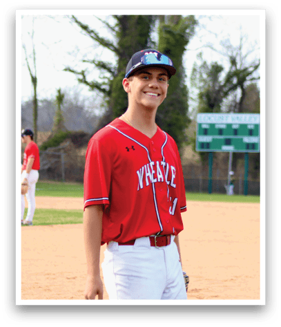 A baseball player wearing a red and white uniform. Description generated by AI