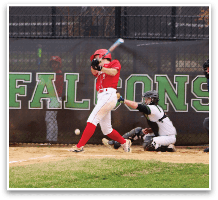A baseball player is swinging a bat at a ball. Description generated by AI