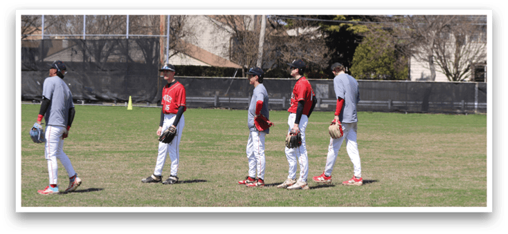 A baseball player in a red shirt and white pants running on a field. Description generated by AI