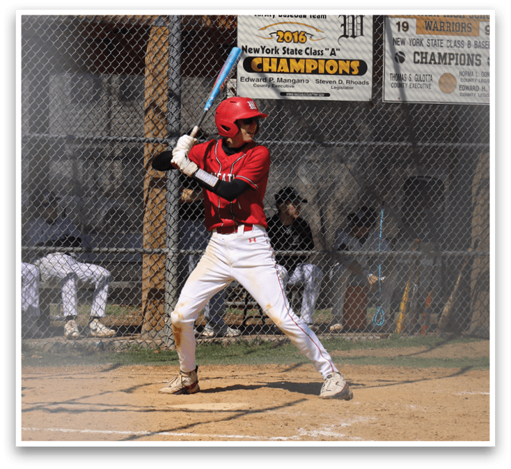 A baseball player wearing a red shirt and white pants running on the field. Description generated by AI