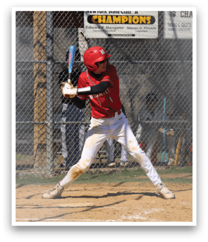 A baseball player wearing a red shirt and white pants. Description generated by AI