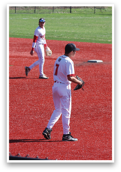 A baseball field with three players on it. Description generated by AI