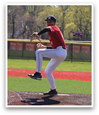A baseball player in a red shirt and white pants is pitching a ball. Description generated by AI