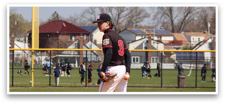 A baseball player in a black and white uniform is standing on the pitcher's mound. Description generated by AI