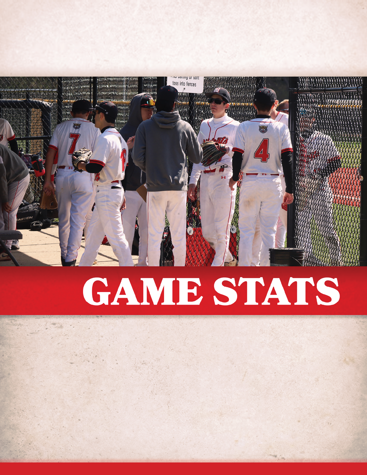 A group of baseball players standing on a field. Description generated by AI