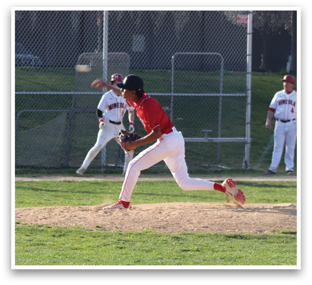 A baseball player in a red shirt and white pants is pitching a ball. Description generated by AI