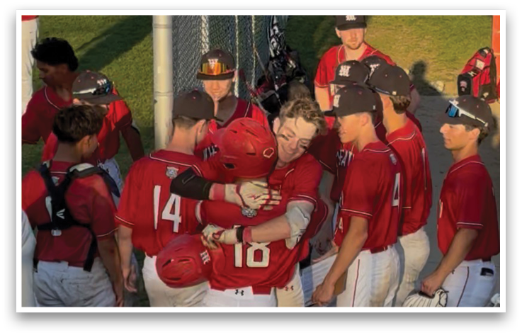 A group of baseball players hugging each other. Description generated by AI