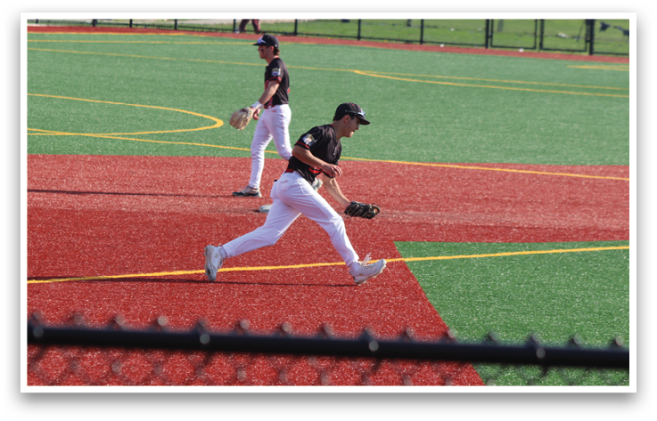 A baseball player running on a field. Description generated by AI