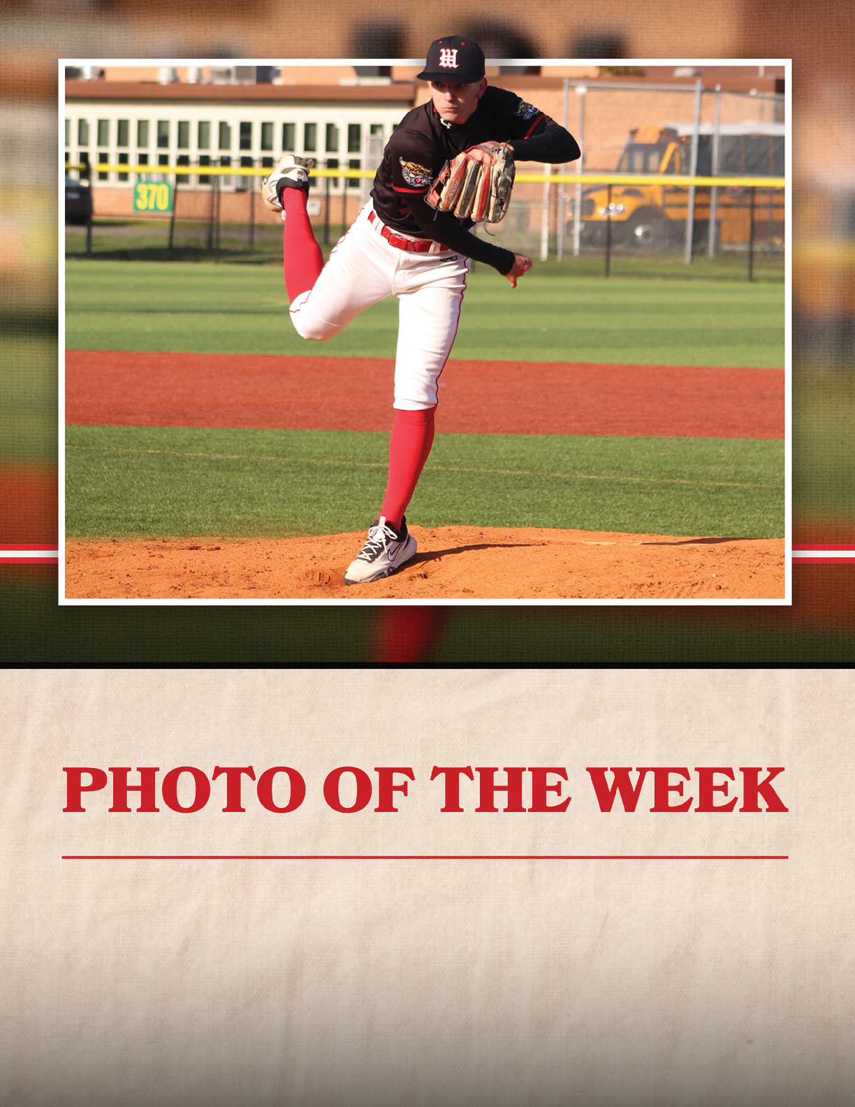 A baseball player in a black and red uniform is pitching a ball. Description generated by AI