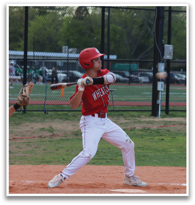 A baseball player in a red shirt and white pants is swinging a bat. Description generated by AI
