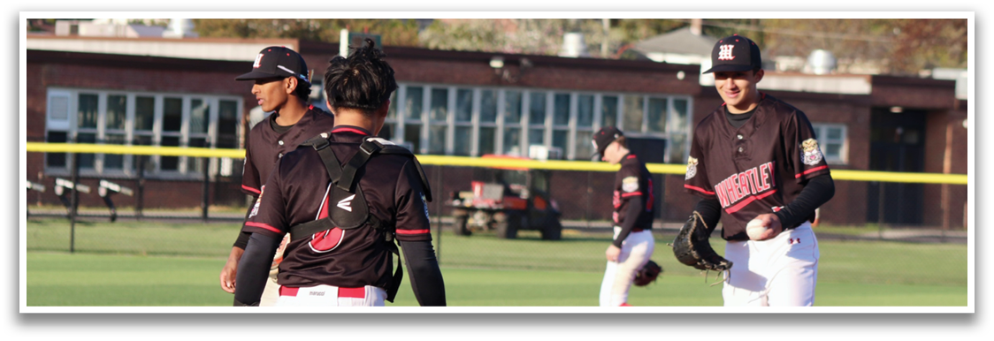 A baseball game is taking place with a group of people standing on the field. Description generated by AI