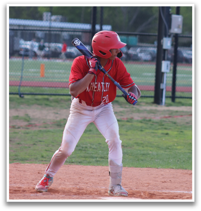 A baseball player in a red shirt and white pants is swinging a bat. Description generated by AI
