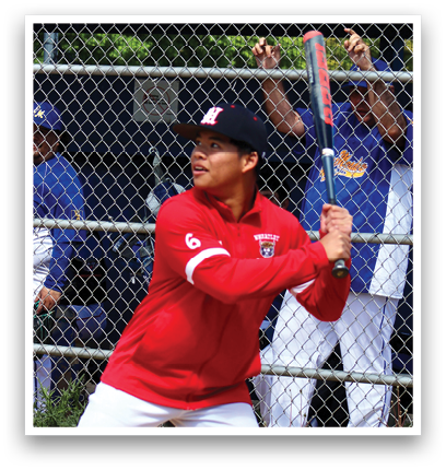 A baseball player in a red shirt and white pants is holding a bat and getting ready to swing. Description generated by AI