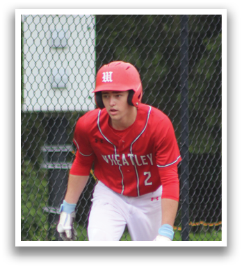A baseball player in a red shirt and white pants is catching a ball. Description generated by AI