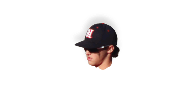A man wearing a black hat. Description generated by AI