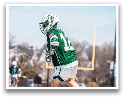 A man wearing a green and white uniform is running on a field. AI generated content