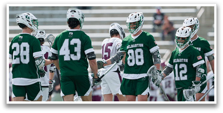 A group of men wearing green and white uniforms are standing on a field with their hockey sticks. AI generated content