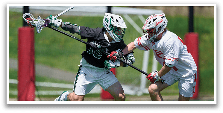 Two men playing lacrosse, one with a stick in the air, the other trying to block him. AI generated content