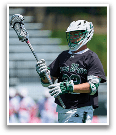 A man wearing a black shirt and white pants holds a lacrosse stick. AI generated content