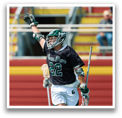 A man in a black and green jersey is holding a stick and celebrating on a field. AI generated content