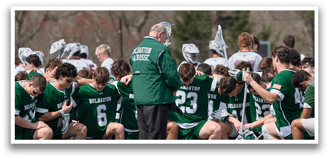 Two men playing lacrosse, one with the number 28 on his jersey. AI generated content