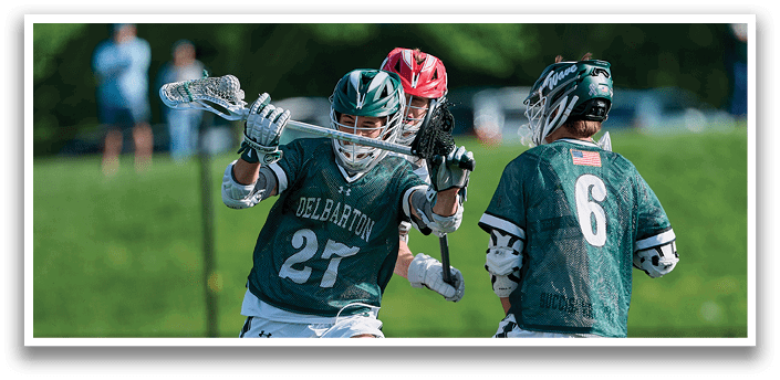 Two men playing lacrosse on a field. AI generated content