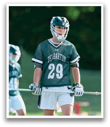 A man wearing a black shirt and white pants holds a lacrosse stick. AI generated content