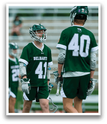 A group of men wearing green jerseys are standing on a field. AI generated content