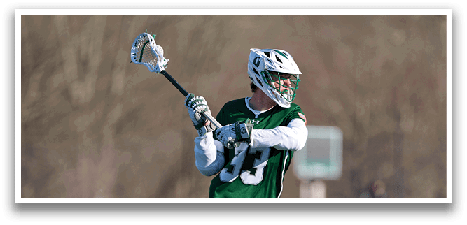A man in a green and white uniform is holding a lacrosse stick and preparing to shoot the ball. AI generated content