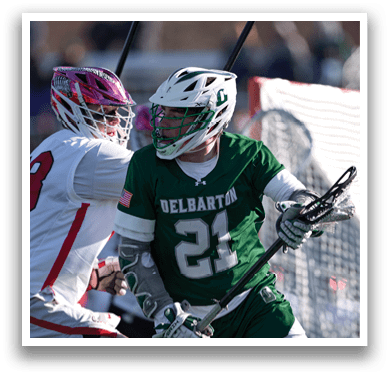 Two men in green and white uniforms are playing a game of lacrosse. One man is holding a lacrosse stick and is about to hit the other player. AI generated content