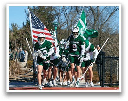 A group of lacrosse players carrying their sticks and flags as they run down the field. AI generated content