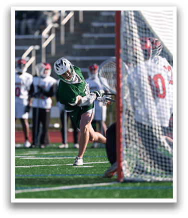 A man in a green shirt and white pants is playing hockey, attempting to score a goal. AI generated content