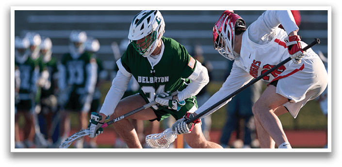 Two men playing lacrosse, one with a green jersey and the other with a red jersey. AI generated content